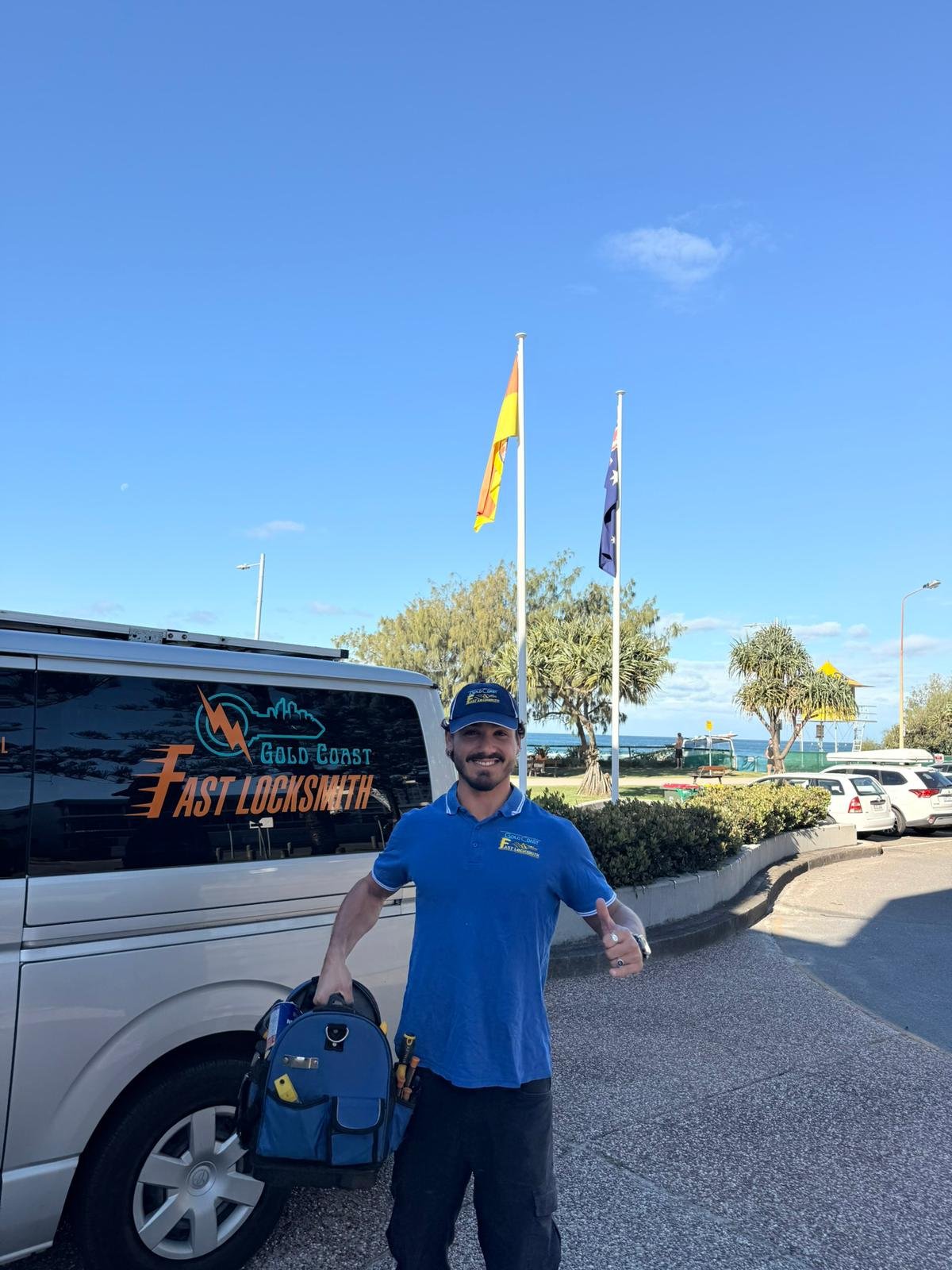 Gold Coast locksmith giving thumbs up at the beach — Mount Nathan - 24/7 Mobile  Gold Coast