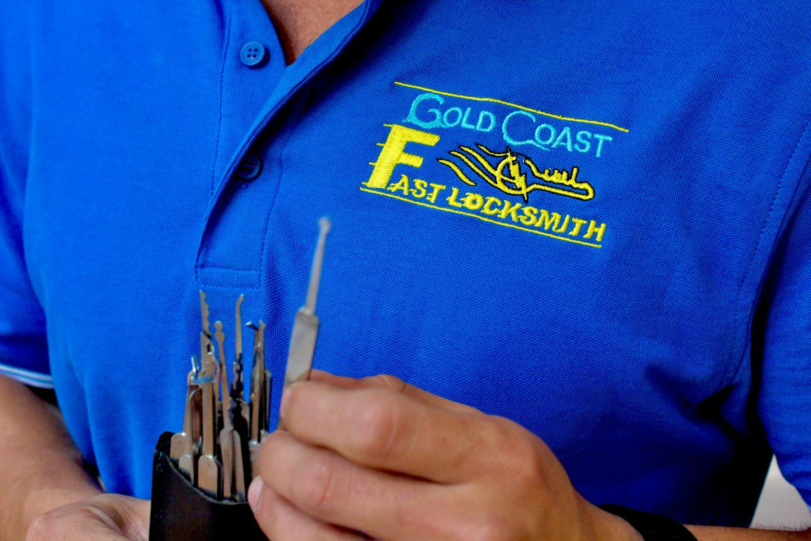 Gold Coast Fast Locksmith logo with lock picks — Ormeau - 24/7 Mobile  Gold Coast