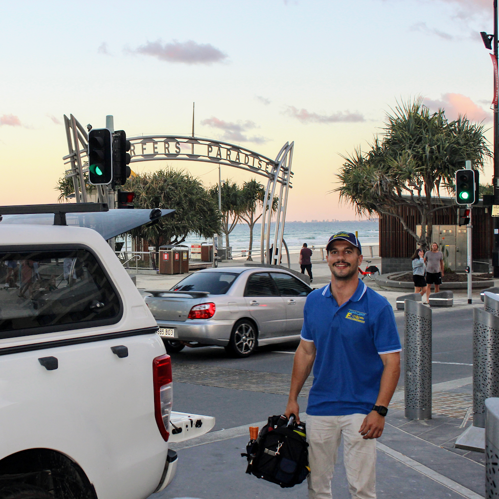 Gold Coast Fast Locksmith at Surfers Paradise arch smiling